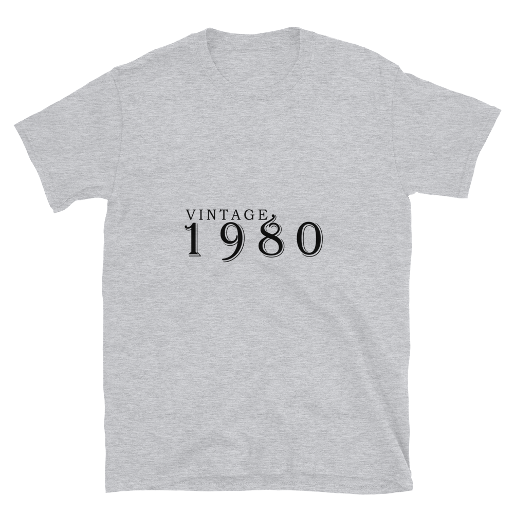 Gray Tshirt, front view, with the text of "Vintage 1980" typed on it.